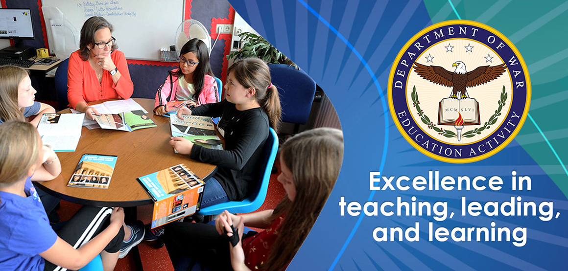DoWEA teacher and students gathered around a table